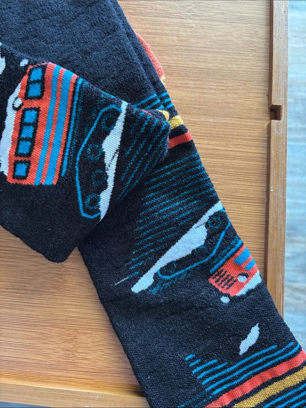 Smartwool Men's Black Snow Socks with Orange Teal and White Ski Bus Pattern